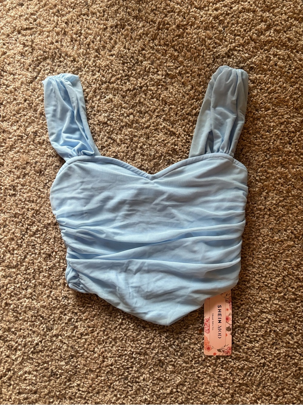 Light blue tank top with sweetheart neckline